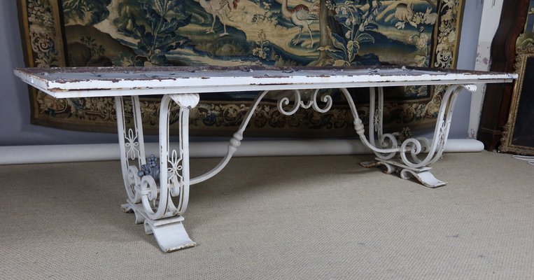 Large wrought iron table discount