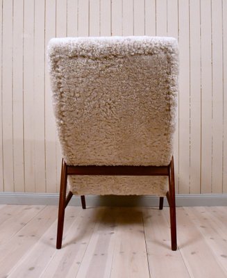 Swedish Siesta Lounge Chair with Footrest in Teak and Sheepskin from Jio Mobler 1950s Set of 2 for sale at Pamono