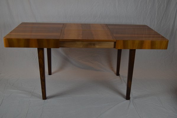 Mesa de comedor de teca con cuatro sillas, años 60 Mesa de comedor de teca con cuatro sillas, años 60