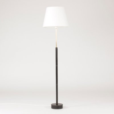 black mid century floor lamp