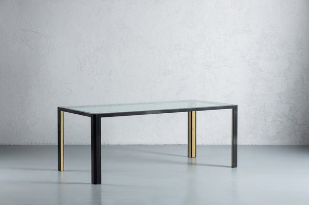 Tavolo da pranzo vintage con ripiano in cristallo e cornice nera