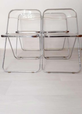 Sedie pieghevoli Plia trasparenti di Giancarlo Piretti Anonima