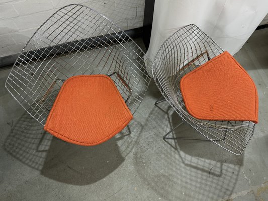 Set of Diamond Chairs in Silver with Orange Seat by Harry Bertoia