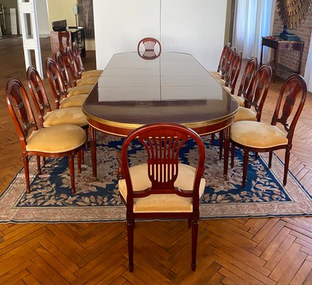 SUITE DE DOUZE CHAISES DE SALLE A MANGER LOUIS XV, DIX DU MILIEU DU
