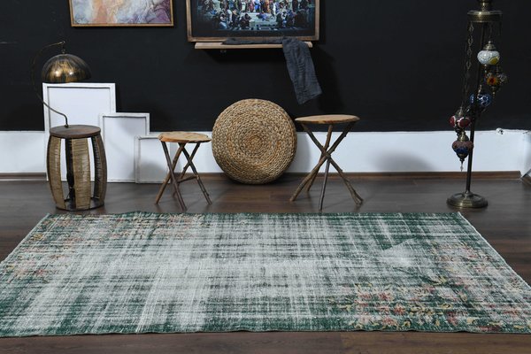 vintage faded rug in interior design