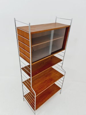 String System: Cabinet with Flip Door | Buy String online at A+R