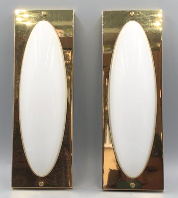 Pair of Brass & Opaline Glass Sconces by Jean Perzel Pair of Brass & Opaline Glass Sconces by Jean Perzel