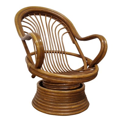 Swivel Rocking Armchair in Bamboo and Rattan 1950s for sale at Pamono
