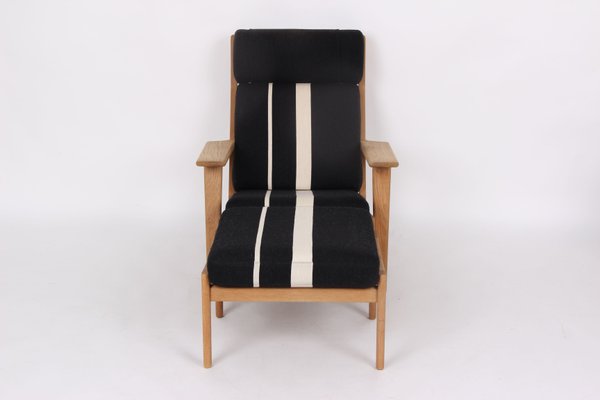 Model Ge290a Armchair & Ge290s Footstool by Hans J. Wegner Model Ge290a Armchair & Ge290s Footstool by Hans J. Wegner