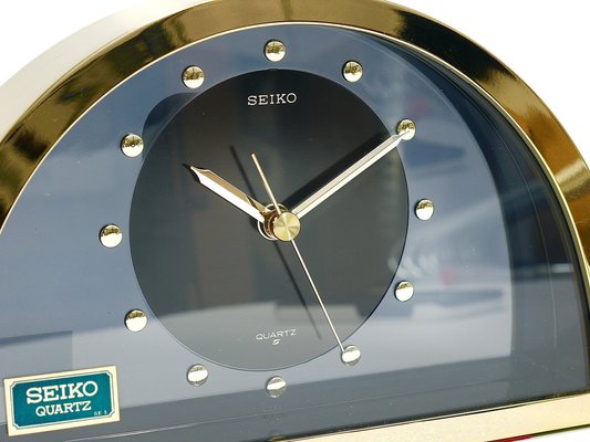Hollywood Regency Brass See-Through Table Clock attributed Hollywood Regency Brass See-Through Table Clock attributed