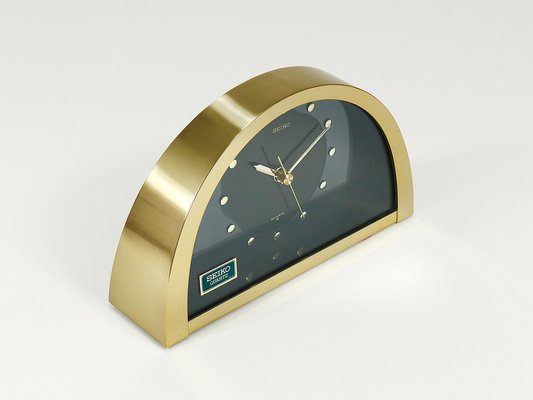 Hollywood Regency Brass See-Through Table Clock attributed Hollywood Regency Brass See-Through Table Clock attributed