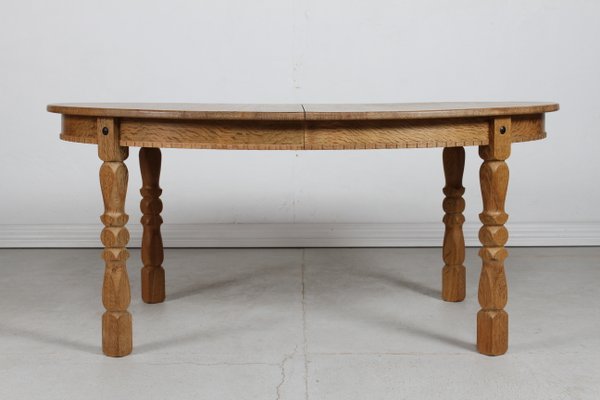 Danish Oval Oak Extendable Dining Table by Henning Kjærnulf, 1970s