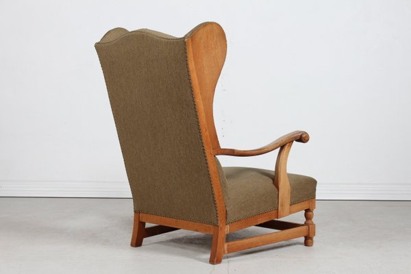 Königlicher Stuhl mit Hoher Rückenlehne aus Eiche mit Grüner Wolle von Axel Einar Hjorth, Dänemark, 1940er bei Pamono kaufen