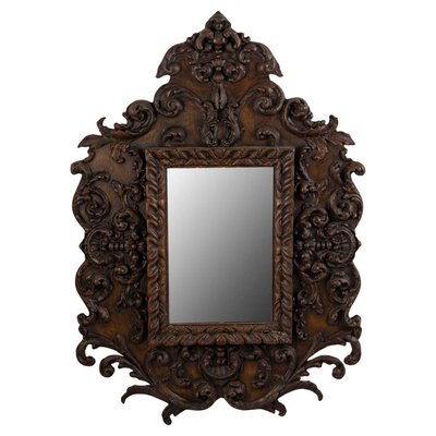 A 19th Century French Patinated Oak Framed Mirror A 19th Century French Patinated Oak Framed Mirror