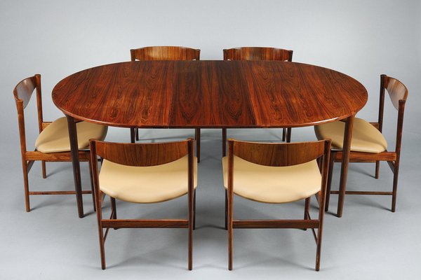 Rosewood Dining Table with Extension Leaf and Chairs by Ib Kofod