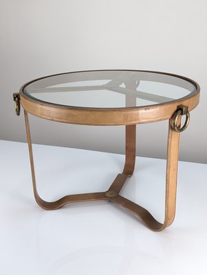 A Black Leather Wrapped and Chrome Jacques Adnet Glass Top Coffee Table A Black Leather Wrapped and Chrome Jacques Adnet Glass Top Coffee Table