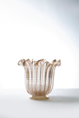 A Gold Flecked and Ribbed Clear Glass Vase by Ercole Barovier for Barovier & Toso A Gold Flecked and Ribbed Clear Glass Vase by Ercole Barovier for Barovier & Toso