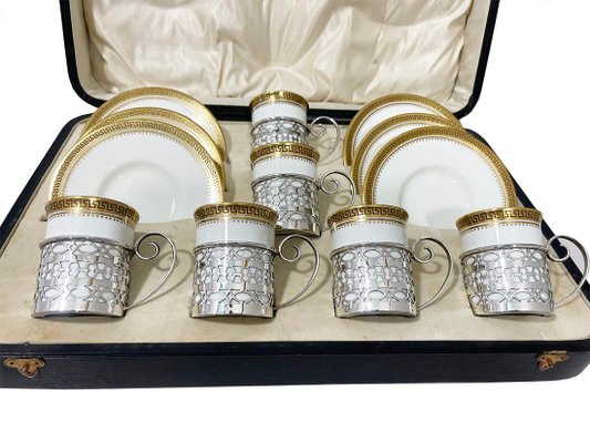 Coffee Cups and Saucers with Silver Cup Holders attributed