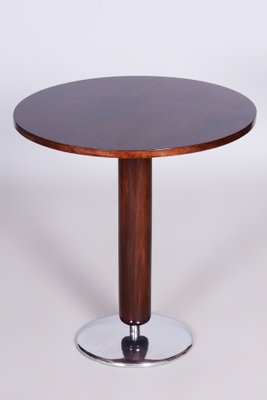 Tavolo rotondo Art Déco in noce e metallo cromato attribuito a