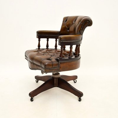 Antique leather captains chair sale