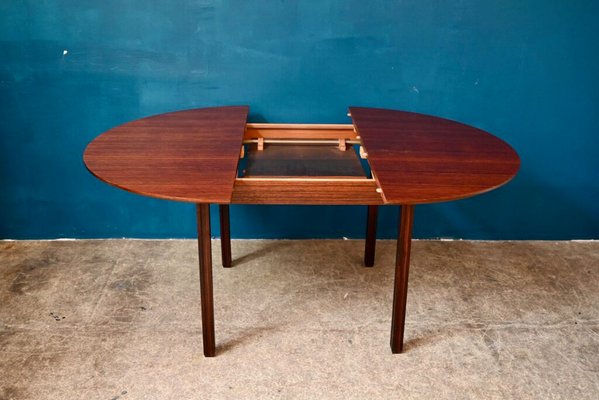Italian Round Oval Rosewood Dining Table with Extension, 1970s for