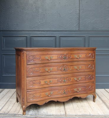 Carved chest of drawers discount