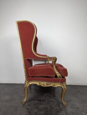Regency Style Bergere Armchair in Gilded Wood