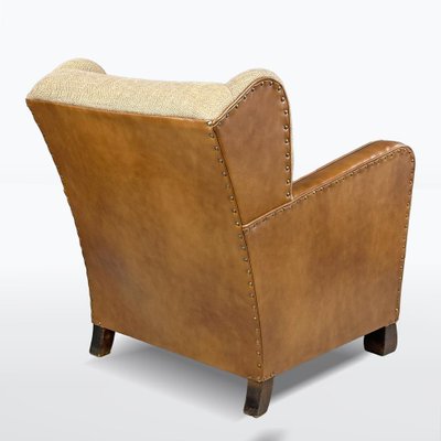 Antiker Sessel aus Leder & Stoff mit Ohren, 1920er bei Pamono kaufen