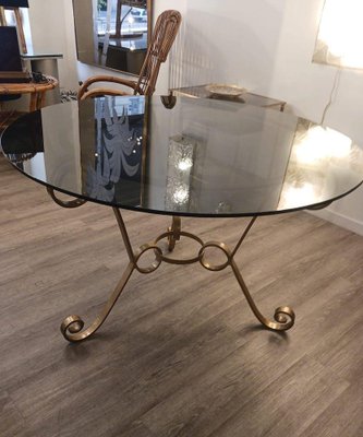 Tavolo rotondo vintage in ottone e vetro, anni '50