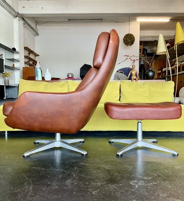 Vintage Vinyl Leather Lounge Swivel Chair and Ottoman in Cognac Brown 1970s Set of 2