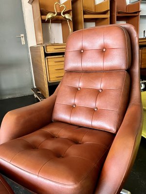Set of Vintage Vinyl Leather Lounge Swivel Chair and Ottoman in