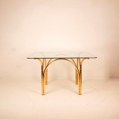 Tavolo in cristallo e ottone, Italia, anni '70 in vendita su Pamono