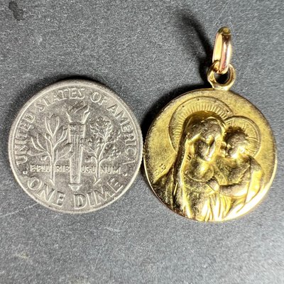 Never Say Never Medaglia in oro giallo e oro bianco 18k con la Madonna Bambina da 18 mm traforata e catena forzata di 45 cm e 1,20 g tutto oro 18 k