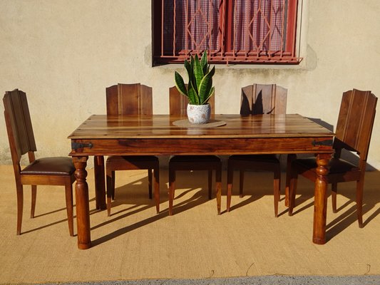 Rot iron dining table discount