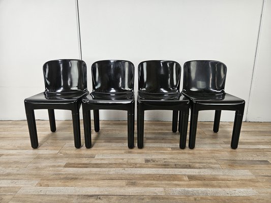 Sedie da pranzo moderne in plastica nera nello stile di Kartell