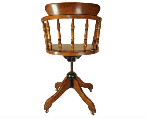 Antique Captains Desk Chair with Brass Stud Detailing and Iron Base 1930s