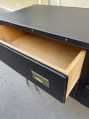 A Three Drawer Rosewood Commode in the Manner of Jacques Adnet A Three Drawer Rosewood Commode in the Manner of Jacques Adnet
