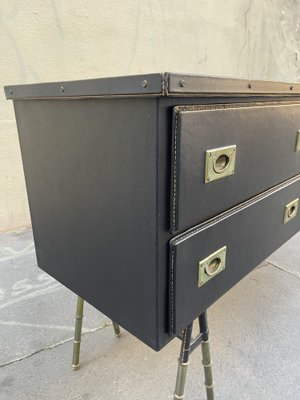A Three Drawer Rosewood Commode in the Manner of Jacques Adnet A Three Drawer Rosewood Commode in the Manner of Jacques Adnet