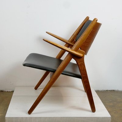 Scandinavian CH28 Chair in Teak and Black Leather by Hans Wegner