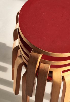 L-Leg Stools in Red Linoleum and Birch by Alvar Aalto for