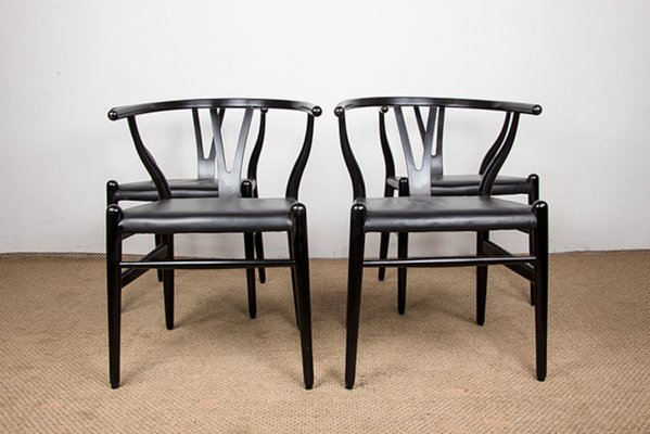 Danish Model CH 24 Wishbone Chairs in Black Lacquered Wood and