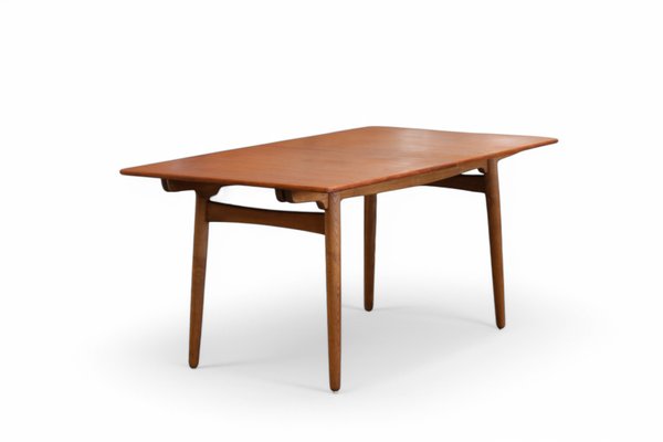 AT310 Dining Table in Teak and Oak by Hans Wegner for Andreas Tuck, 1950s