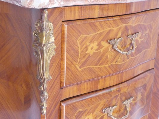A Three Drawer Rosewood Commode in the Manner of Jacques Adnet A Three Drawer Rosewood Commode in the Manner of Jacques Adnet