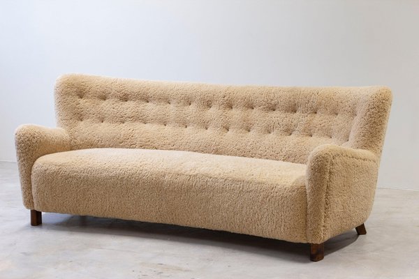 Model 1669 Curved Sofa in Sheepskin by Fritz Hansen for FDB, 1950s for sale at Pamono