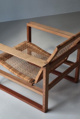 Set of Model 246 Lounge Chair and Ottoman in Oak and Teak Set of Model 246 Lounge Chair and Ottoman in Oak and Teak