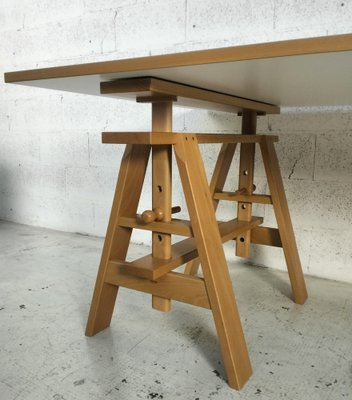 Tavolo Leonardo regolabile in legno di Achille Castiglioni per