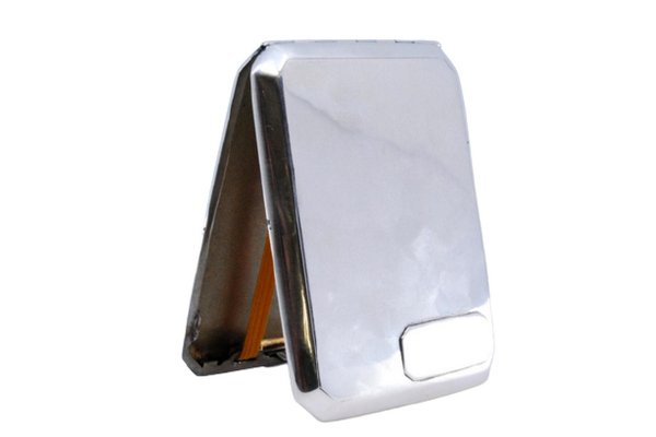 silver cigarette box with hinged lid What is this lid? - What is it? An Ornate Silver Cigarette Case