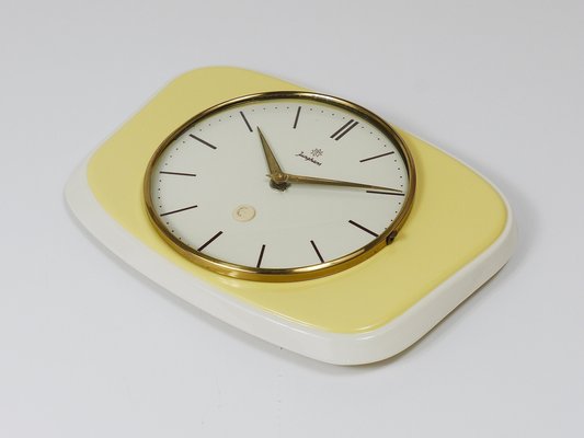 Pastel Yellow Midcentury Wall Clock in the style of Max Bill from