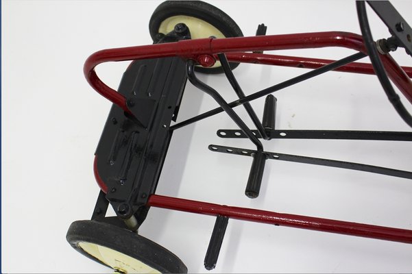 Red and yellow plastic pedal car hotsell