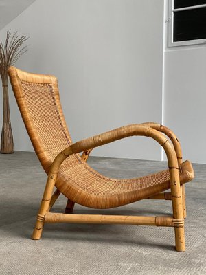 Arco Armlehnstuhl aus Rattan & Bambus, 1960er bei Pamono kaufen